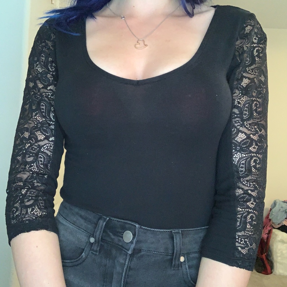 Black blouse, size small, the brand is ambiance :)
